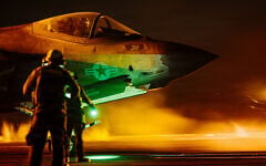 US Sailors signal an F-35C Lightning II on the flight deck of the USS George Washington, in a photo released August 30, 2026. (US Navy photo)
