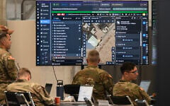 Personnel work at the US-led Civil-Military Coordination Center (CMCC), in the southern town of Kiryat Gat, on November 19, 2025. (Ahikam Seri / AFP)