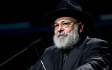 Rabbi Yehoram Ulman speaks during the “Light Will Win” memorial service at the Sydney Opera House in Sydney on January 22, 2026, as part of the national day of mourning for the victims of the December 14, 2025 Bondi Beach shooting. (Steven Markham/AFP)