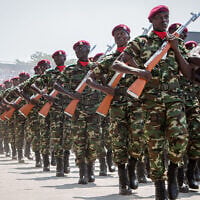 Illustrative: Soldiers of the Burundi National Defense Force (FDNB) march in formation during the official military parade marking the 64th anniversary of Burundi’s Independence Day at Stade Intwari in Bujumbura, on July 1, 2026. (Herve Shabani/AFP)