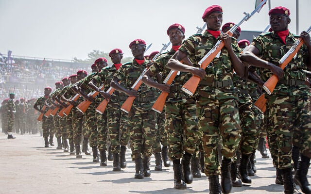 Illustrative: Soldiers of the Burundi National Defense Force (FDNB) march in formation during the official military parade marking the 64th anniversary of Burundi’s Independence Day at Stade Intwari in Bujumbura, on July 1, 2026. (Herve Shabani/AFP)