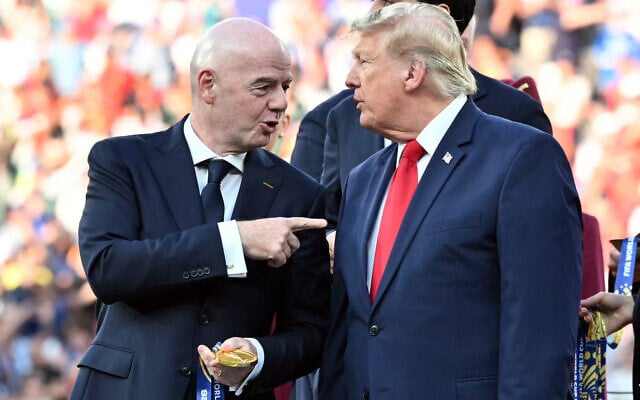 FIFA President Gianni Infantino speaks with US President Donald Trump during the presentation ceremony of the 2026 World Cup football tournament final match between Spain and Argentina at the New York/New Jersey Stadium in East Rutherford on July 19, 2026. (Mandel NGAN/AFP)