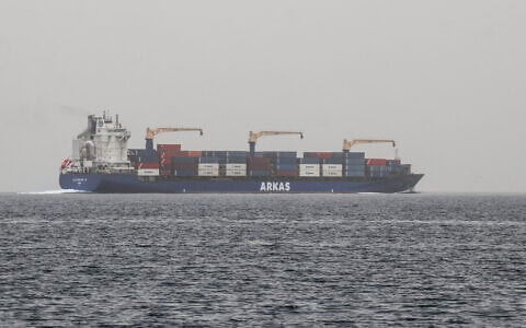 FILE: A commercial vessel passes through an international shipping lane off Yemen’s Hanish Island in the Red Sea on July 27, 2026. (Khaled ZIAD/AFP)