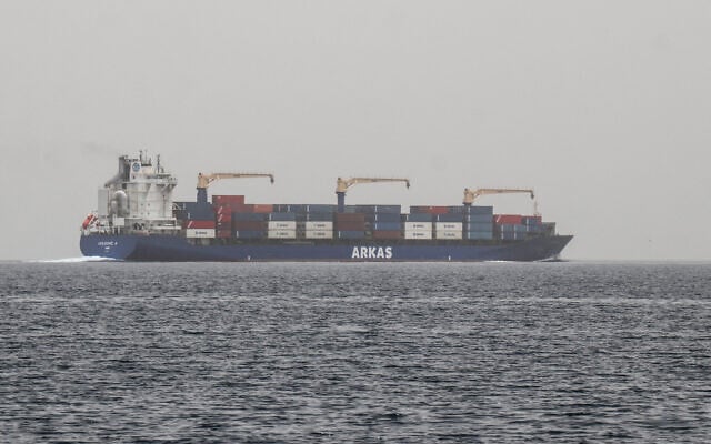 FILE: A commercial vessel passes through an international shipping lane off Yemen’s Hanish Island in the Red Sea on July 27, 2026. (Khaled ZIAD/AFP)