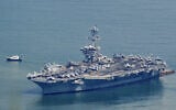 The USS George Washington arrives at the port in Danang, Vietnam, July 30, 2026. (Nhac NGUYEN/AFP)