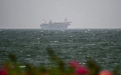 A vessel is seen off the coast of Sharjah in the United Arab Emirates on August 3, 2026. (AFP) A vessel is seen off the coast of Sharjah in the United Arab Emirates on August 3, 2026. (AFP)