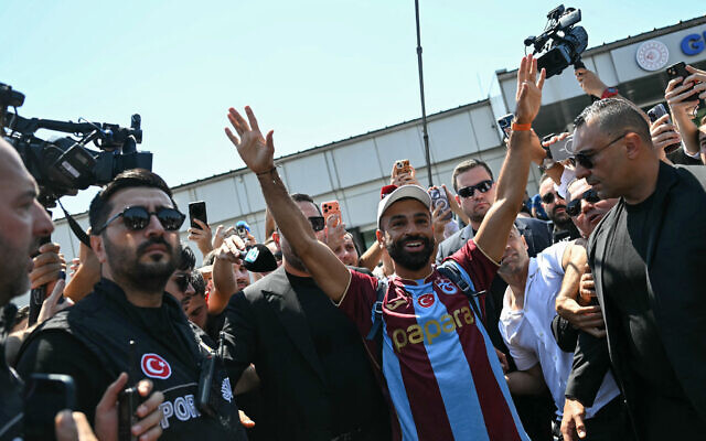 Egyptian forward Mohamed Salah gestures as he arrives at Istanbul Ataturk Airport to complete his transfer to Turkish football club Trabzonspor in Istanbul on August 5, 2026. (Ozan KOSE/AFP) Egyptian forward Mohamed Salah gestures as he arrives at Istanbul Ataturk Airport to complete his transfer to Turkish football club Trabzonspor in Istanbul on August 5, 2026. (Ozan KOSE/AFP)