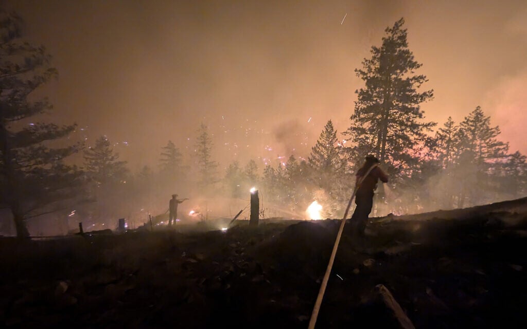 Canada wildfires force 20,000 to flee as British Columbia declares state of emergency