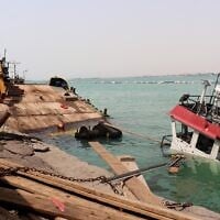The navigation bridge of a sunken vessel is all that is seen at the surface of the water in the Port of Mokha, the day after an attack by the Houthis on the city Mokha, held by Yemen’s internationally recognized, Aden-based government on August 10, 2026. (Khaled ZIAD/AFP)