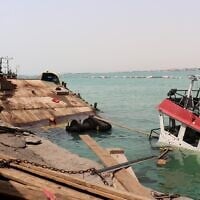 Illustrative: The navigation bridge of a sunken vessel is all that is seen at the surface of the water in the Port of Mokha, the day after an attack by the Houthis on the city Mokha, held by Yemen’s internationally recognized, Aden-based government on August 10, 2026. (Khaled ZIAD/AFP)