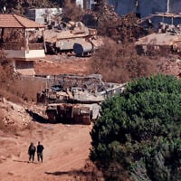 A photograph taken from the southern Lebanese viallage of of Zawtar al-Gharbiyah shows Israeli troops stationed in the nearby village of Zawtar al-Charkiyah on August 11, 2026. (Ammar Ammar/AFP)