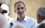 Co-president of French center-left party Place Publique (PP) Raphael Glucksmann speaks with journalists in Jonquiere, southwestern France, on August 12, 2026. (Valentine CHAPUIS/AFP)
