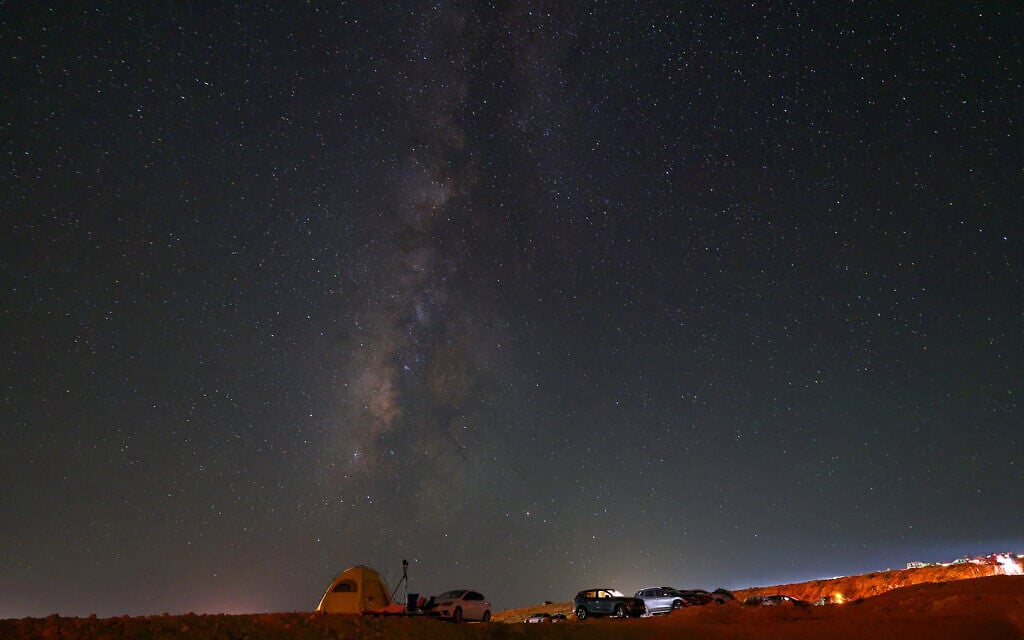 Perseid meteor streaks are seen across the sky at Mount Ramon in the Negev Desert, near the town of Mitzpe Ramon, Israel on August 13, 2026. (JACK GUEZ/AFP)