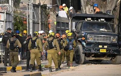 IDF troops arrive at the site of a collapsed building to assist with rescue operations following an earthquake in Cali, Colombia, on August 14, 2026. (Raul ARBOLEDA/AFP)
