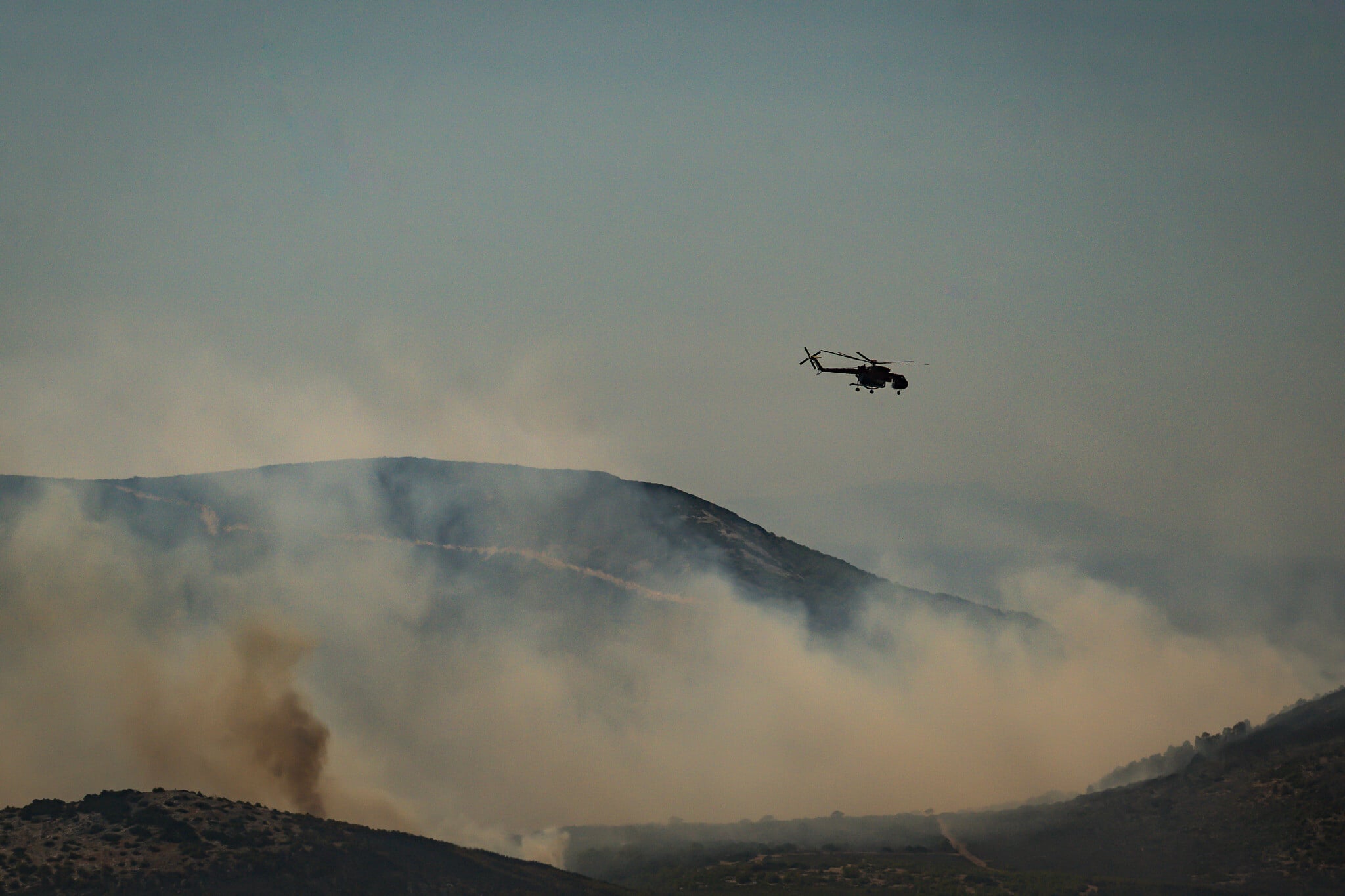 Two dead and hundreds evacuated following wildfire on Greek island near Athens