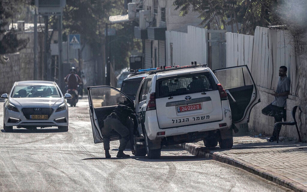 An Israel Police vehicle is parked along the side of a road in East Jerusalem’s predominantly Arab neighborhood of Silwan on August 23, 2026. (ilia YEFIMOVICH/AFP) An Israel Police vehicle is parked along the side of a road in East Jerusalem’s predominantly Arab neighborhood of Silwan on August 23, 2026. (ilia YEFIMOVICH/AFP)