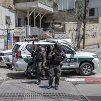 Israeli police patrol a street in East Jerusalem’s predominantly Arab neighbourhood of Silwan on August 23, 2026. (ilia YEFIMOVICH/AFP)