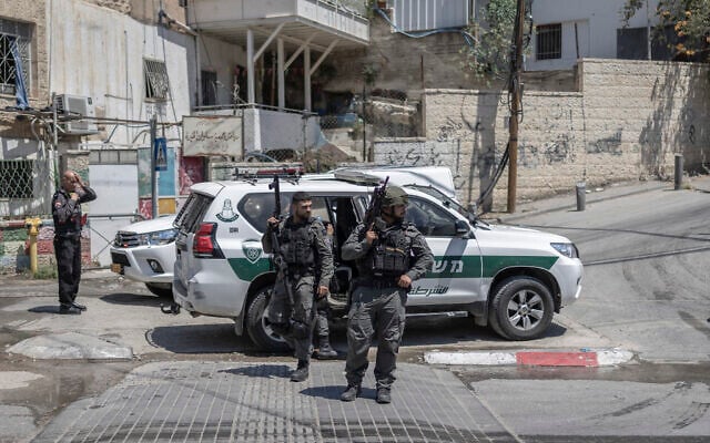 Israeli police patrol a street in East Jerusalem’s predominantly Arab neighbourhood of Silwan on August 23, 2026. (ilia YEFIMOVICH/AFP)