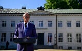 German Chancellor Friedrich Merz gives a statement prior to the start of a retreat meeting of the German cabinet on August 25, 2026 in Neuhardenberg, northeastern Germany. (John MacDougall/AFP)