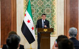 Mazloum Abdi, leader of the Kurdish-led Syrian Democratic Forces (SDF), speaks during a televised speech at the People’s Palace in Damascus on August 25, 2026. (Bakr Alkasem/AFP)