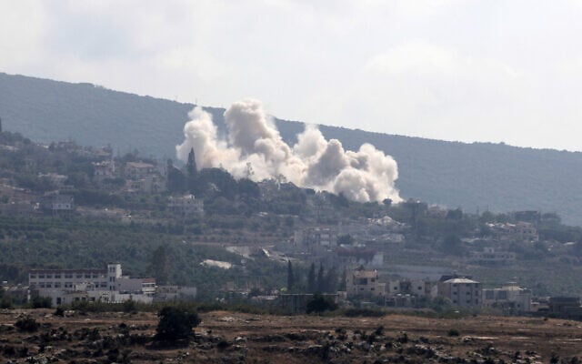 This photo taken from the southern Lebanese city of Tyre shows smoke rising following an Israeli strike that targeted the village of Biout es Sayed on August 26, 2026. (KAWNAT HAJU/AFP)