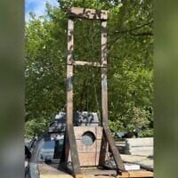 This handout photo from the US Capitol Police taken on August 25, 2026, shows a guillotine in the back of a pickup truck on the 100 block of East Capitol Street in Washington, DC, near the US Capitol and Supreme Court. (Handout/US Capitol Police/AFP)