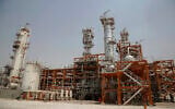 In this photo released by official website of the office of the Iranian Presidency on April 16, 2017, a part of the South Pars gas field facility is seen after being inaugurated by President Hassan Rouhani, on the northern coast of Persian Gulf, Iran. (Iranian Presidency Office via AP)