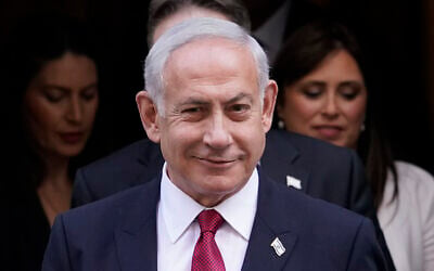 Prime Minister Benjamin Netanyahu leaves 10 Downing Street after a meeting with Britain’s Prime Minister Rishi Sunak in London, March 24, 2023. (AP Photo/Alberto Pezzali)