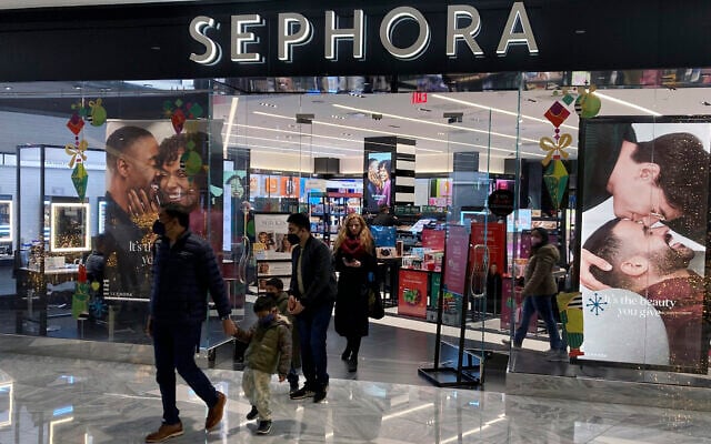 Illustrative: People leave a Sephora store in the Hudson Yards shopping mall in New York City on December 4, 2021. (AP Photo/Ted Shaffrey)