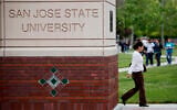 People walk on the campus of San Jose State University in San Jose, Calif., on May 5, 2009. (AP Photo/Paul Sakuma)