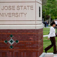 People walk on the campus of San Jose State University in San Jose, Calif., on May 5, 2009. (AP Photo/Paul Sakuma)