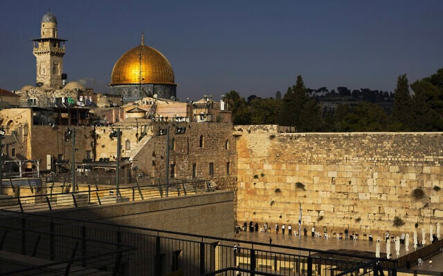 Jews pray at the Western Wall, beside the Temple Mount, known to Muslims as the Noble Sanctuary, or the Al-Aqsa Mosque compound, in the Old City of Jerusalem, October 16, 2023. (AP Photo/Jon Gambrell) Jews pray at the Western Wall, beside the Temple Mount, known to Muslims as the Noble Sanctuary, or the Al-Aqsa Mosque compound, in the Old City of Jerusalem, October 16, 2023. (AP Photo/Jon Gambrell)