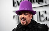 Boy George poses for photographers upon arrival at The Evening Standard Theatre Awards in London, November 19, 2023. (Scott Garfitt/Invision/AP)