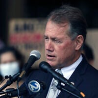 US Rep. Ed Case of Hawaii speaks at a rally, February 11, 2022, in Honolulu. (AP Photo/Caleb Jones)