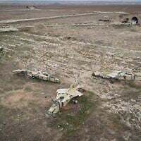 Decommissioned Syrian Air Force planes are seen at the Abu al-Duhur military airport, east of Idlib, following the takeover of the area by Syrian opposition fighters on December 7, 2024. (AP Photo/Omar Albam)