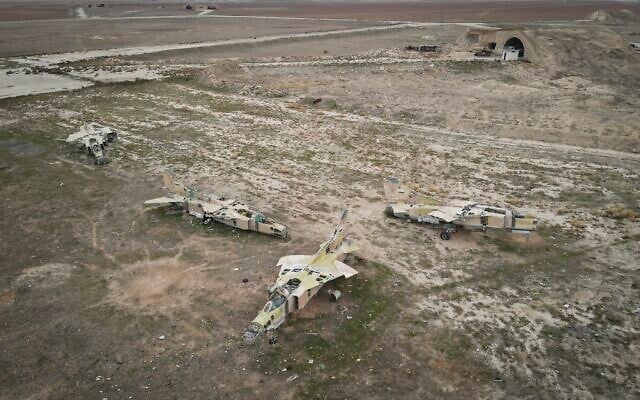 Decommissioned Syrian Air Force planes are seen at the Abu al-Duhur military airport, east of Idlib, following the takeover of the area by Syrian opposition fighters on December 7, 2024. (AP Photo/Omar Albam)
