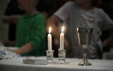 Illustrative: Congregants of the 104-year-old Pasadena Jewish Temple and Center which burned down in the Eaton fire, gather for Shabbat dinner at the First United Methodist Church in Pasadena, Calif., April 4, 2025. (AP Photo/Damian Dovarganes)