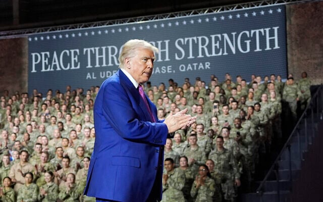 US President Donald Trump applauds as he leaves after speaking at the Al Udeid Air Base, May 15, 2025, in Doha, Qatar. (AP Photo/Alex Brandon)