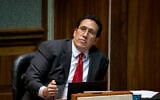 Democratic State Sen. Jarrett Keohokalole, watches a colleague speak during a floor session at the State Capitol, April 30, 2025, in Honolulu, Hawaii. (AP Photo/Mengshin Lin)