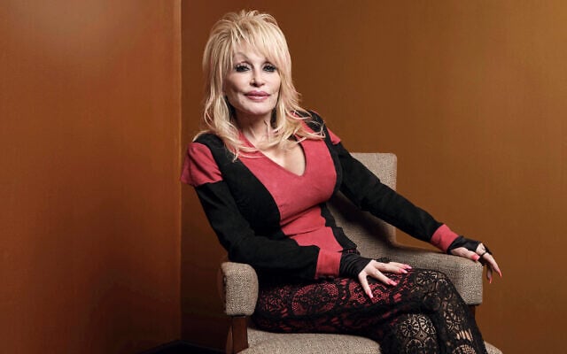 Dolly Parton poses at the Carnegie Medal of Philanthropy Ceremony in New York, on October 13, 2022. (AP/Andres Kudacki)