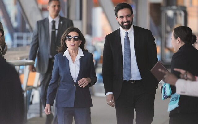 New York Governor Kathy Hochul and New York City Mayor Zohran Mamdani arrive to a news conference in the Staten Island borough of New York, April 27, 2026. (AP Photo/Seth Wenig)