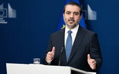 Syrian Minister of Foreign Affairs Asaad Hassan Al-Shaibani addresses a media conference following the meeting of the Syria Partnership Coordination Forum in Brussels, May 11, 2026. (AP Photo/Marius Brugelman)