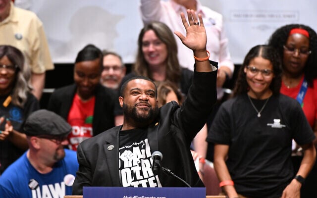 Michigan state Rep. Donavan McKinney, D-Detroit, waves to the crowd during a campaign rally for Michigan Democratic US Senate primary candidate Abdul El-Sayed, July 18, 2026, in Detroit. (AP Photo/Jose Juarez)