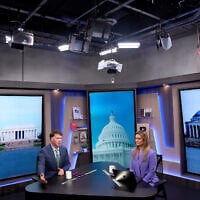 Ryan Grim, left, and Krystal Ball record a segment for the YouTube daily news show, Breaking Points, July 27, 2026, in Washington. (AP/Jacquelyn Martin)