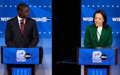 Democratic gubernatorial candidate Francesca Hong, right, talks as David Crowley listens during a primary debate in Milwaukee, Wisconsin, July 28, 2026. (AP Photo/Nam Y. Huh)