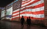 An Image of the US and Israeli flags is projected on the walls of Jerusalem’s Old City, July 22, 2025. (AP Photo/Mahmoud Illean)