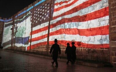 An Image of the US and Israeli flags is projected on the walls of Jerusalem’s Old City, July 22, 2025. (AP Photo/Mahmoud Illean) An Image of the US and Israeli flags is projected on the walls of Jerusalem’s Old City, July 22, 2025. (AP Photo/Mahmoud Illean)