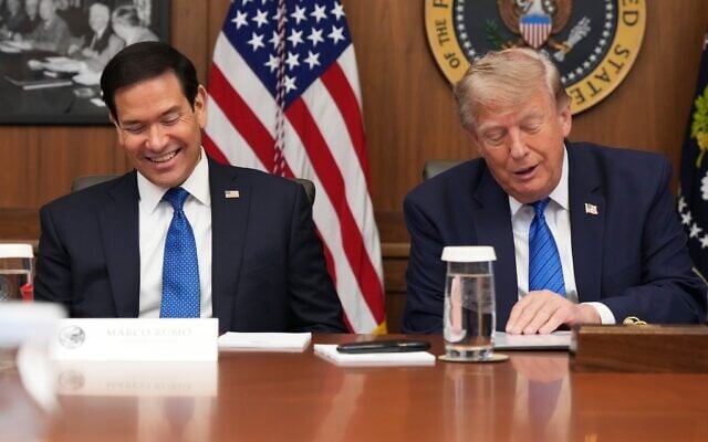 US Secretary of State Marco Rubio, left, and President Donald Trump attend a cabinet meeting, July 31, 2026, at Camp David, the presidential retreat, near Thurmont, Maryland, July 31, 2026. (AP Photo/Jacquelyn Martin)