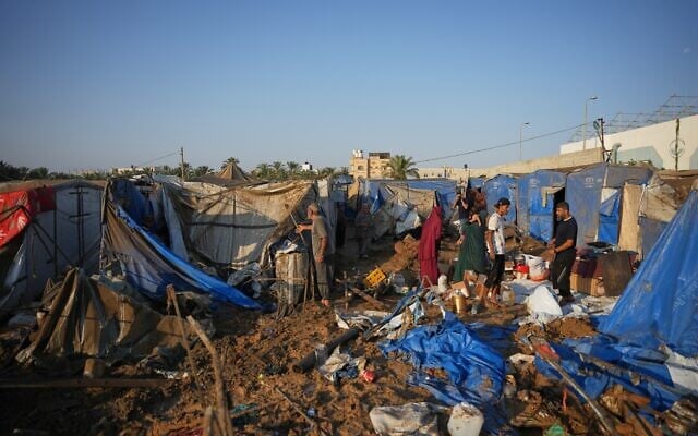 Palestinians inspect the site of an Israeli airstrike near al-Aqsa Hospital in Deir al-Balah, central Gaza Strip, August 1, 2026. (AP/Abdel Kareem Hana) Palestinians inspect the site of an Israeli airstrike near al-Aqsa Hospital in Deir al-Balah, central Gaza Strip, August 1, 2026. (AP/Abdel Kareem Hana)