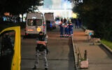 A policeman stands guard near the site where an improvised explosive device detonated at a restaurant in central Moscow, Russia, August 1, 2026. (AP Photo/Pavel Bednyakov)